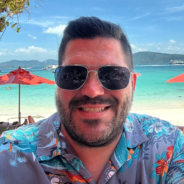 Jeff, founder of Passport2Pride, traveling at the beach